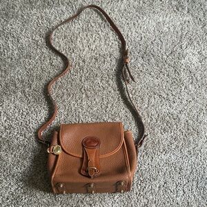 Dooney & Bourke all weather leather shoulder/cross body handbag